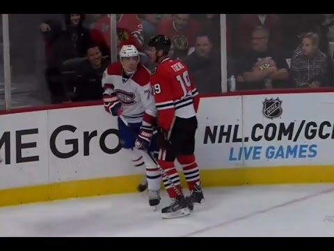 Alexei Emelin Hits Jonathan Toews Scrum Ensues (10/1/14)