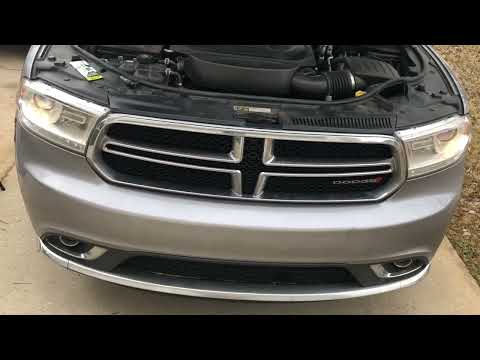 How to replace 2014-2018 Dodge Durango head lights. No tools needed.