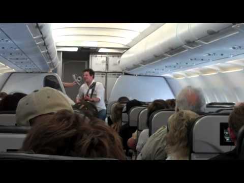 David St. Romain sings Twenty Years Late for delayed Frontier Airlines flight