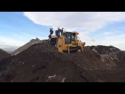 Caterpillar D9T Dozer And D7R Working Together