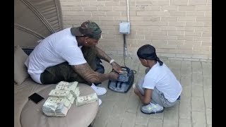 Moneybagg Yo Teaches His Son How To Use A Money Counter