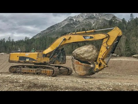 Liebherr 976 Excavator Loading Mercedes And MAN Trucks.