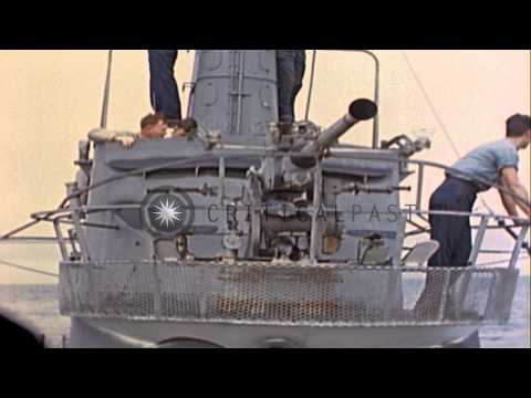 US submarine rescues Japanese crew from boat damaged by their gunfire during  Wor...HD Stock Footage