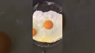 Perfect fried eggs in butter