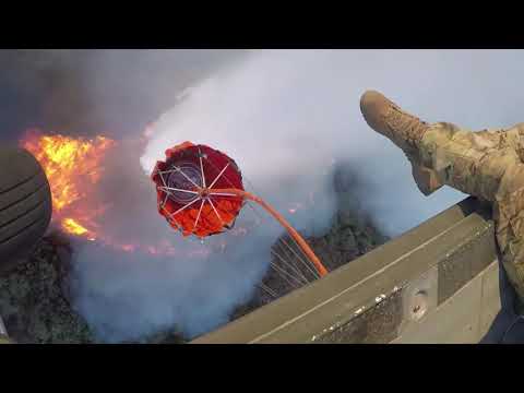 National Guard troops continue to battle wildfires