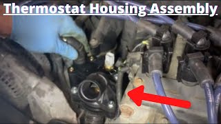 How to Replace a Thermostat/Thermostat Housing Assembly Ford Explorer