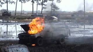 preview picture of video 'Okeechobee Mudfest 2011 TRUCK FIRE MuddFreak Mud Truck Atv 4x4 bogging boggin huge tires'