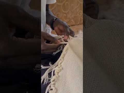 Franges tissées à la main, le geste minutieux de nos artisans