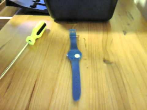 comment regler la date sur une montre swatch irony
