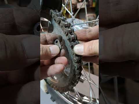 chain link installation, motorcycle or dirt bike