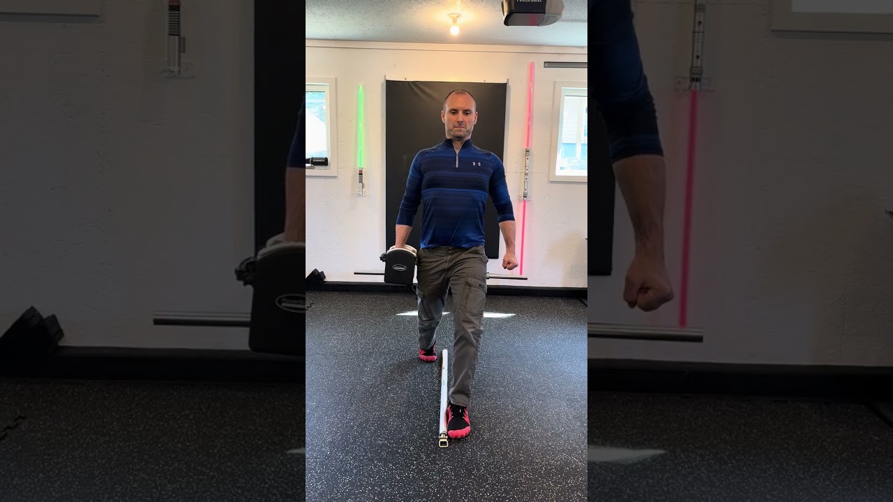 4. Narrow Split Stance Suitcase Hold (Front View)