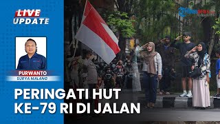 Momen Pengguna Jalan di Kota Malang Peringati Detik-detik Proklamasi di Jalan Ijen saat 17 Agustus