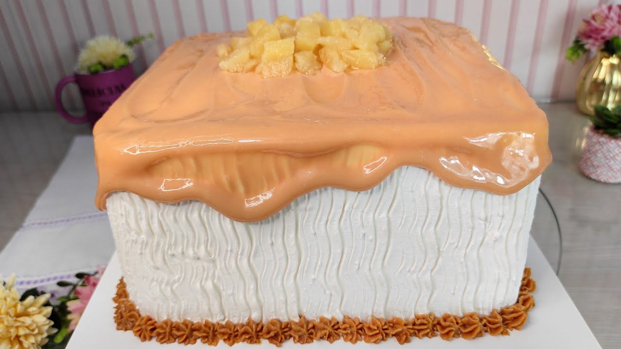 BOLO RECHEADO DE DOCE DE LEITE COM ABACAXI, UMA COMBINAÇÃO PERFEITA