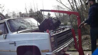 Removal of a 350 and transmission from a 1986 Chevy C10.