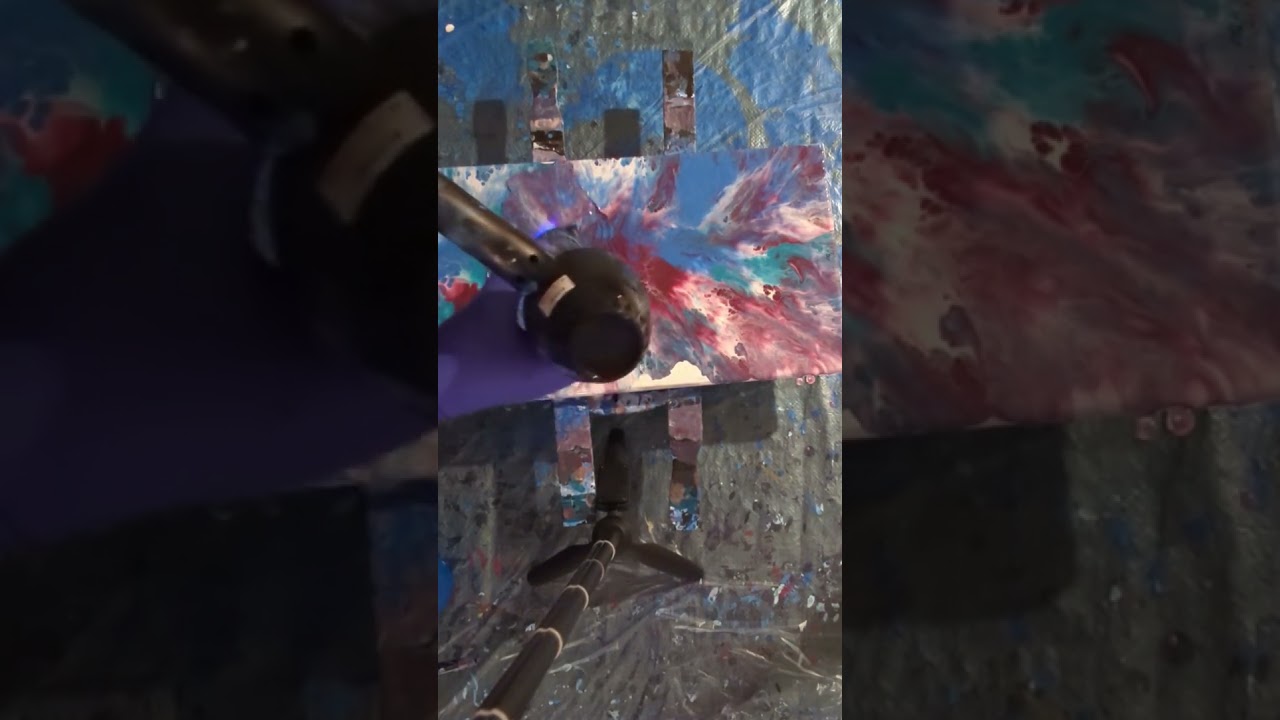 Blowout Fluid Art Techniques - Stretching the paint across the canvas.