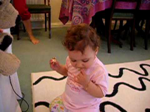 Maria Luisa feeding the dog