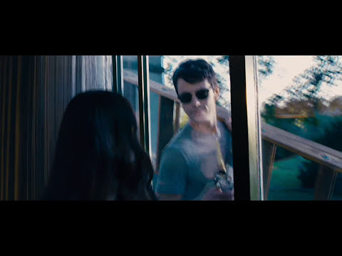 Trailer still: India and Charlie at the piano, fingers crossing — the Glass duet as seduction