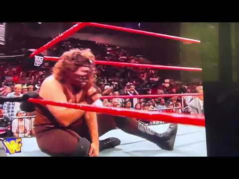 Mankind Puts the Mandible Claw on Commissioner Sgt. Slaughter During in Ring Interview with Jim Ross