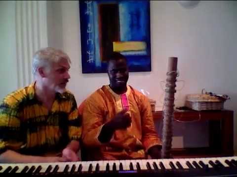 Kora Lesson 1 - Sulayman Jobarteh - How to tune a Kora