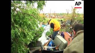 Search and rescue teams fanned out across the devastated city of Joplin, Missouri on Tuesday.  The A