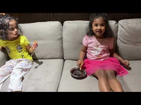 Appu and Norah making cake