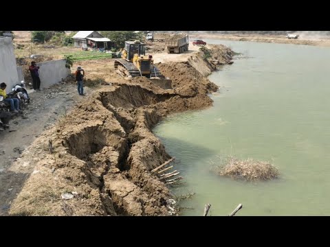 Strong Bulldozer Pushing Soil Fill Bury Crack And Sink Land 
