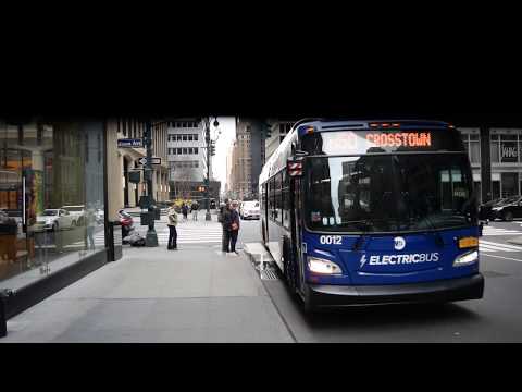 West Side-bound XE40 (12) M50 bus approaching 49th Street/Madison Avenue