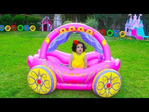 Sami and Amira Pretend Play with Princess Carriage Inflatable Toy