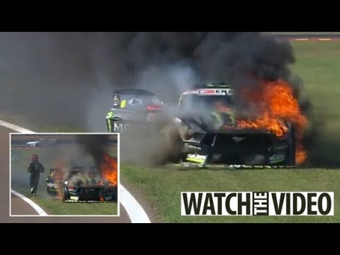 Watch terrifying moment car bursts into FLAMES during race and driver dashes away from blazing scene