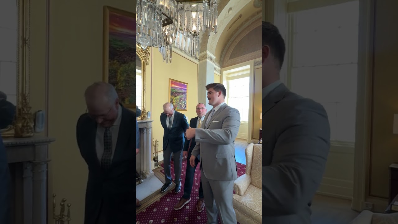 Senator John Hoeven, Senate Majority Leader John Thune. NDSU Players Grey & Jett Zebel