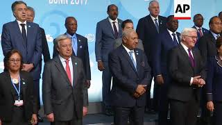 Leaders, officials at climate talks pose for family photo