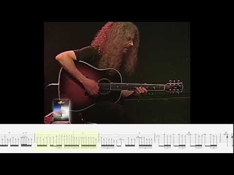 Somebody gave Guthrie Govan an acoustic guitar again