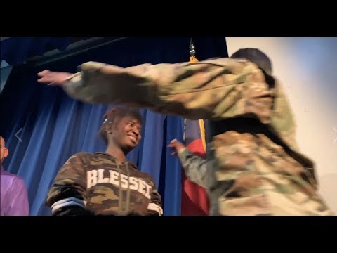 Mom soldier surprises Deaf daughter at AASD (ASL - 11.11.18)