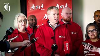 Hipkins speaks to the media from the Auckland Asia Festival