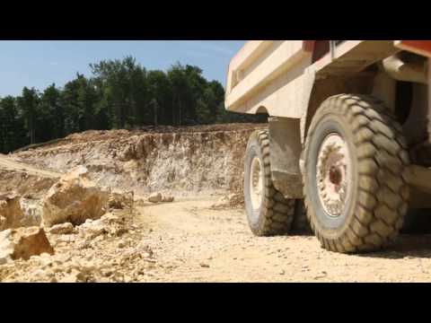 Hitachi ZX670LCH-5 and EH750 dump trucks in Germany
