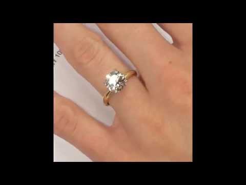 Round Cut Diamond Ring in White and Yellow Gold