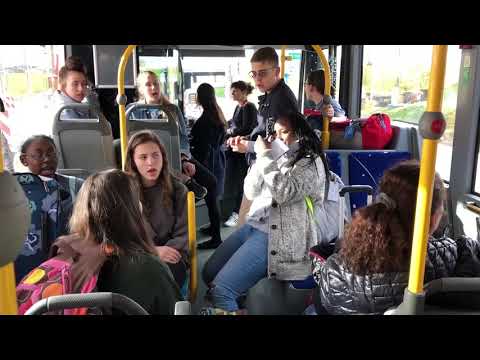 High School Chorus Sings on Airport Shuttle While Stranded in Paris
