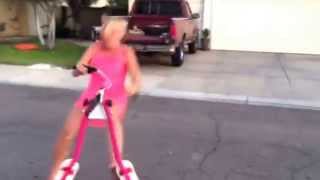 Pushing 60Hot blonde grandma thinks she's cool riding the grandkids scooter and falls on her ass.