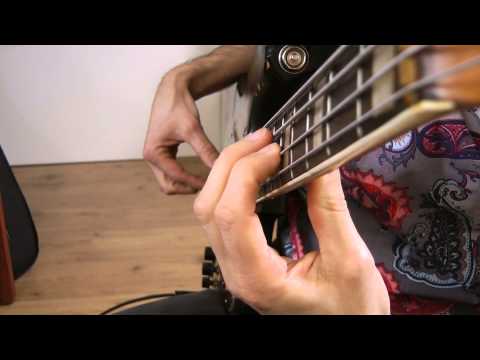 Tec0110 - Playing without unwanted noise (muting the strings with the fretting hand) - German Bas...