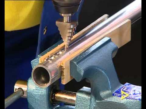 Drilling of round hole in round pipe