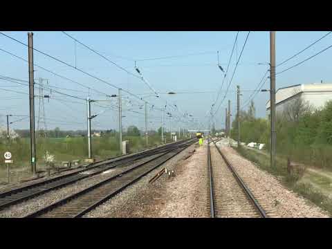 DB Cargo UK 90019 on hire to Virgin Trains East Coast pushes a Leeds to Kings Cross service.