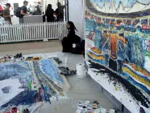 Ian Cook - painting using car wheels in Abu Dhabi 2009 F1