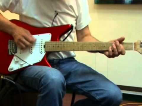 Albert Lee on rhythm guitar