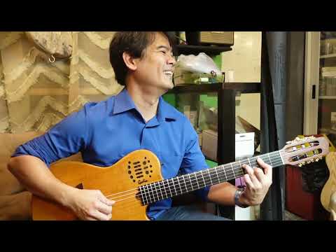 Jimmy Bondoc sings his hit song with his Restored Godin