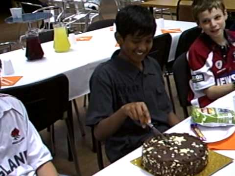 Azeem cutting cake.AVI