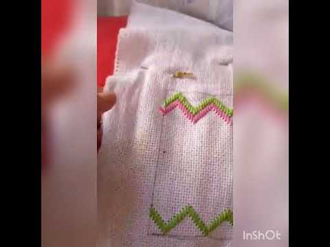 Toalha bordada ponto reto e eliós