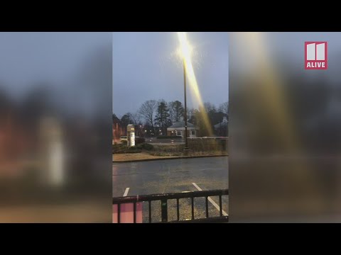 Snow begins to fall in Roswell, Georgia