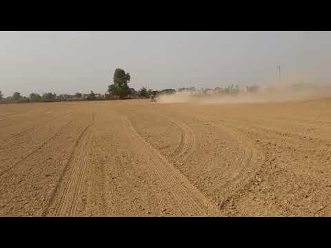 Precision laser guided land leveler