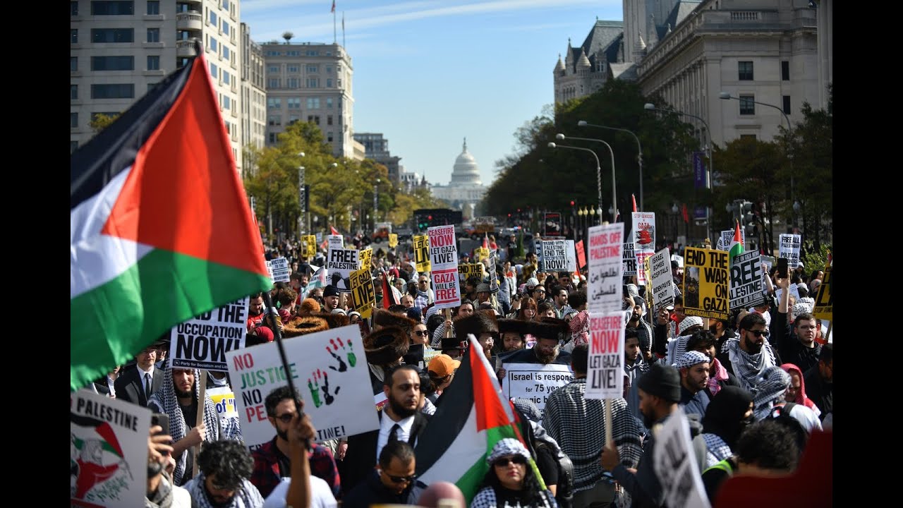 Flooding D.C. streets and bashing Biden thousands demand Gaza cease-fire