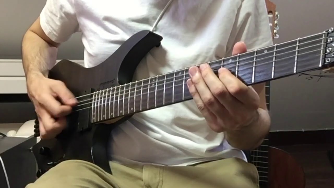 Roberto Barlocci playing the palm-muted Lost Eden prog-metal riff by Atomic Symphony on electric guitar.
